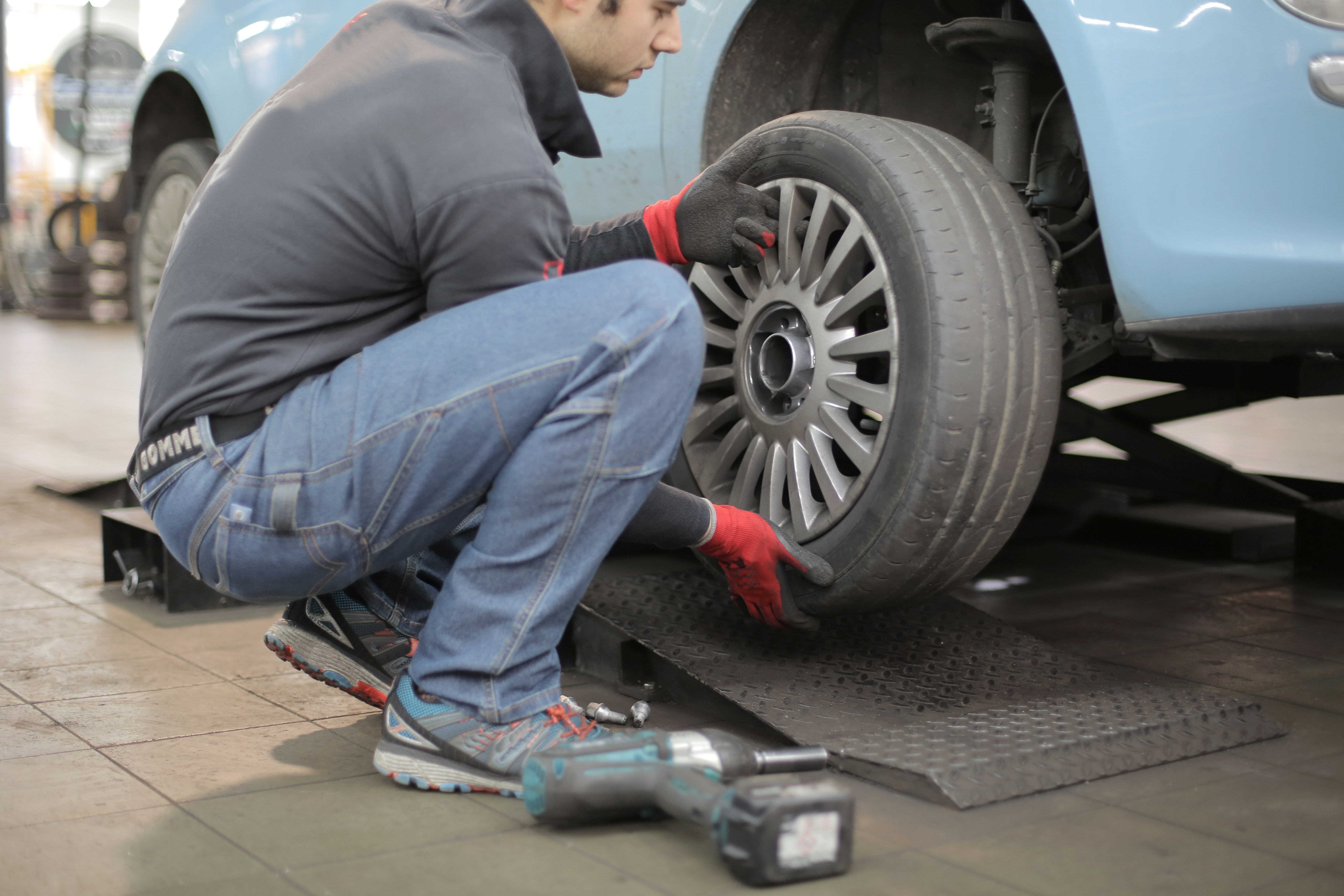 Man Replacing Winter Tires